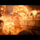A dragon breathes fire out of its mouth as heroes escape on a bridge.
